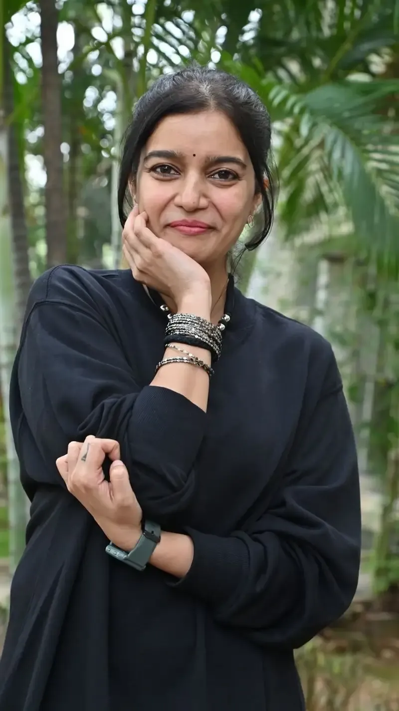 Actress Colors Swathi in Black Dress at Month Of Madhu Movie Press Meet